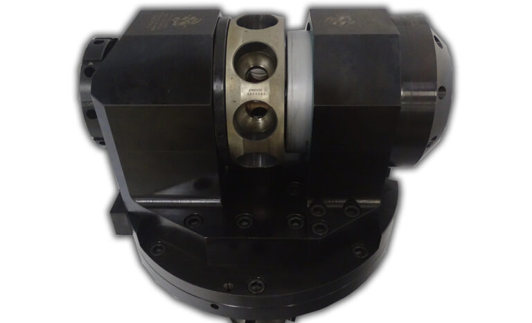 Indexing Collet Chuck with top clamp and actuation package, chuck indexes nine times to perform ID grinding operation.